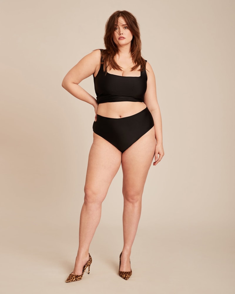 Front of a model wearing a size 16 Follow The Sun Swim Bottom in BLACK by Saint Somebody. | dia_product_style_image_id:226816